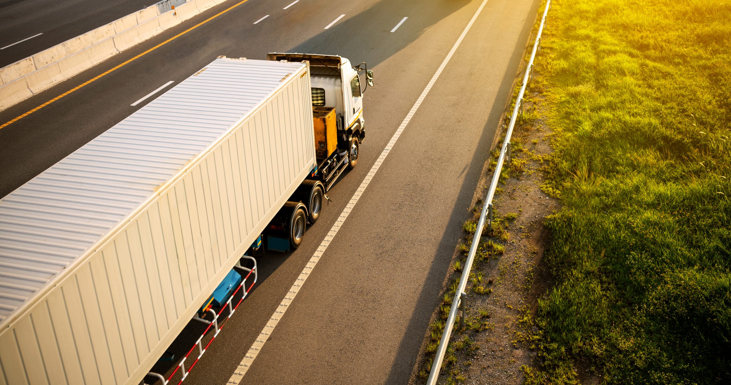 White Truck on highway road with container, transportation conce